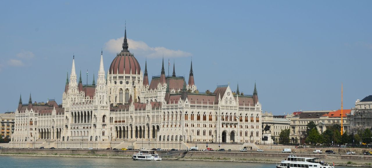 Hungary: Majestic view of the Hungarian Parliament Building along the Danube River in Budapest