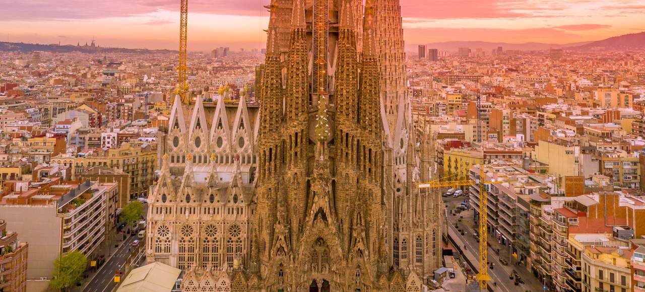 Spain: A breathtaking aerial capture of the Sagrada Familia in Barcelona during a vibrant sunset
