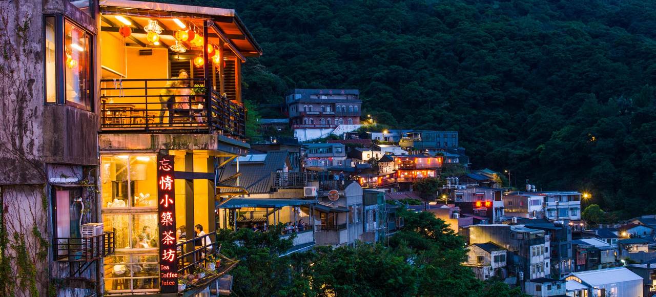 Taiwan: Illuminated cafes and townscape in Jiufen at dusk