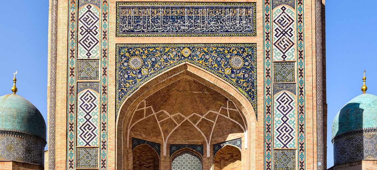 Showcasing the intricate facade of the Barakhan Madrasah in Tashkent, Uzbekistan